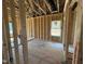New construction bedroom featuring framing, wood floors, natural light and pre-wiring at 268 Meadowbark Bnd # 42, Garner, NC 27529