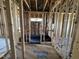 Framed primary bath ready for construction with a window for natural light at 268 Meadowbark Bnd # 42, Garner, NC 27529