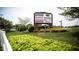 Landscaped shopping center entrance featuring recognizable store signs on a sunny day at 268 Meadowbark Bnd # 42, Garner, NC 27529