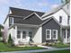 Charming two-story home with a covered front porch and beautifully landscaped front yard at 2922 Alyssa Ct, Raleigh, NC 27604