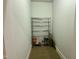 Walk-in pantry area with metal shelving unit for organized storage at 300 Finsbury St # 109, Durham, NC 27703