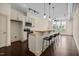 Modern kitchen with stainless steel appliances, granite countertops, and breakfast bar at 300 Finsbury St # 309, Durham, NC 27703