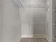 Ample storage space in the walk-in closet with shelving units, providing an organized solution for your wardrobe needs at 300 Finsbury St # 309, Durham, NC 27703