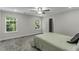 Bright bedroom with carpet, complemented by natural light from the window and soft gray walls at 301 Sawgrass Ct, Mebane, NC 27302