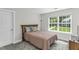 Bright bedroom with large window and natural light at 301 Sawgrass Ct, Mebane, NC 27302