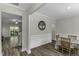 Elegant dining room with wainscoting, hardwood floors, and a stylish table setting at 301 Sawgrass Ct, Mebane, NC 27302
