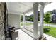 Welcoming front porch with seating, white railing, and ample space for relaxation at 301 Sawgrass Ct, Mebane, NC 27302