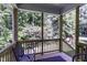 Enjoy a relaxing screened in porch with natural lighting overlooking the backyard in a wooded environment at 301 Sawgrass Ct, Mebane, NC 27302