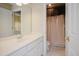 Bathroom with tile floors, large vanity, and shower curtain at 3021 Glenwood Dr, Durham, NC 27705