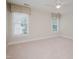 Bedroom features carpet, neutral walls, white trim and a ceiling fan at 3021 Glenwood Dr, Durham, NC 27705