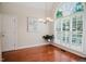 Cozy breakfast nook with hardwood floors and a large window providing ample natural light at 3021 Glenwood Dr, Durham, NC 27705