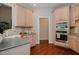 Well-lit kitchen featuring modern appliances and ample counter space at 3021 Glenwood Dr, Durham, NC 27705