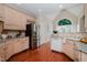 Bright kitchen featuring stainless steel appliances and custom cabinetry at 3021 Glenwood Dr, Durham, NC 27705