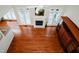 Upstairs view into the expansive living room featuring a fireplace and plentiful windows at 3021 Glenwood Dr, Durham, NC 27705