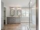 Renovated bathroom boasts double sinks, spacious shower, and elegant finishes at 304 Cayman Ave, Holly Springs, NC 27540