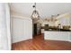 Open dining area with closet, connecting to a fully equipped kitchen at 304 Cayman Ave, Holly Springs, NC 27540