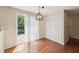 Dining room featuring a sliding glass door to a deck area at 304 Cayman Ave, Holly Springs, NC 27540