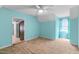 Bright bedroom featuring a ceiling fan, natural light, and colorful walls for a unique touch at 304 Westfield Dr, Dunn, NC 28334