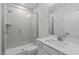Modern bathroom featuring a glass enclosed walk-in shower and bright neutral paint at 309 Highland Forest Dr, Fuquay Varina, NC 27526