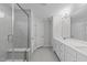 Large bathroom with double vanity, walk-in shower, and neutral paint at 309 Highland Forest Dr, Fuquay Varina, NC 27526