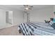 Bedroom with ceiling fan and access to the Primary bath at 309 Highland Forest Dr, Fuquay Varina, NC 27526