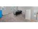 Spacious bonus room featuring plush carpet and natural light from the window at 309 Highland Forest Dr, Fuquay Varina, NC 27526