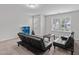 Bright bonus room with neutral walls, carpet, and versatile layout for flexible living at 309 Highland Forest Dr, Fuquay Varina, NC 27526