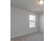 Inviting bedroom with natural light and carpeted flooring, ready to be personalized at 417 Hipwood Dr, Zebulon, NC 27597