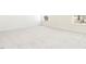 Spacious carpeted bedroom with windows offering exterior views and plenty of light at 425 Hipwood Dr, Zebulon, NC 27597