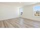 Bright bedroom with natural light and wood-look flooring at 425 Hipwood Dr, Zebulon, NC 27597