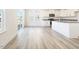 Bright kitchen featuring white cabinets, stainless steel appliances, and granite countertops at 425 Hipwood Dr, Zebulon, NC 27597
