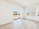Open living room with sliding glass doors leading to the outdoor patio area at 425 Hipwood Dr, Zebulon, NC 27597