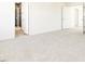 Spacious primary bedroom with a walk-in shower and neutral-toned carpeting at 425 Hipwood Dr, Zebulon, NC 27597