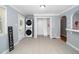 Laundry room with stacked washer and dryer next to closet at 518 Buck Branch Dr, Garner, NC 27529