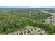 Aerial view of homes backing up to lush greenery and trees at 542 Spaulding St, Burlington, NC 27215