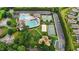 Aerial view of the community pool, tennis courts, and playground at 542 Spaulding St, Burlington, NC 27215