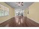 Open floor plan featuring the living room flowing into the white kitchen with a wood island at 542 Spaulding St, Burlington, NC 27215