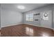 Bright living room with hardwood floors, neutral walls, and a window with plenty of natural light at 542 Spaulding St, Burlington, NC 27215