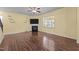 Bright living room featuring wood flooring, a fireplace, and lots of natural light at 542 Spaulding St, Burlington, NC 27215