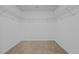 Walk-in closet with metal shelving at 542 Spaulding St, Burlington, NC 27215