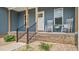 Welcoming front porch featuring rocking chairs, decorative plants, and stylish details with inviting curb appeal at 5550 Mountain Trl, Snow Camp, NC 27349