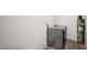 Functional laundry room featuring a side-by-side washer and dryer and built-in storage shelves at 5550 Mountain Trl, Snow Camp, NC 27349