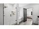 This bathroom features a walk-in shower, soaking tub, and access to the main bedroom at 5550 Mountain Trl, Snow Camp, NC 27349