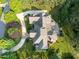 Overhead view showcases the backyard, stone patio, and well-manicured landscaping at 5768 Cavanaugh Dr, Raleigh, NC 27614