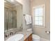 Bathroom featuring a granite countertop vanity and a glass-enclosed shower at 5768 Cavanaugh Dr, Raleigh, NC 27614