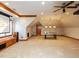 Large bonus room features a movie projector and screen, and foosball table at 5768 Cavanaugh Dr, Raleigh, NC 27614