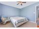 Bedroom with a ceiling fan and a cozy chair at 6 N Carolina Ave, Benson, NC 27504