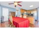 Bright dining space with a view of the kitchen, offering a cozy atmosphere for meals at 6 N Carolina Ave, Benson, NC 27504
