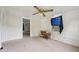 Bedroom featuring carpet flooring, ceiling fan, and an AC unit at 620 Mcadams Rd, Hillsborough, NC 27278