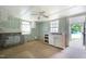 Kitchen needing renovations with a vintage ceiling fan at 620 Mcadams Rd, Hillsborough, NC 27278